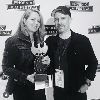Stephanie Lucas and Josh Kasselman at the Phoenix Film Festival with their Best Arizona Feature award